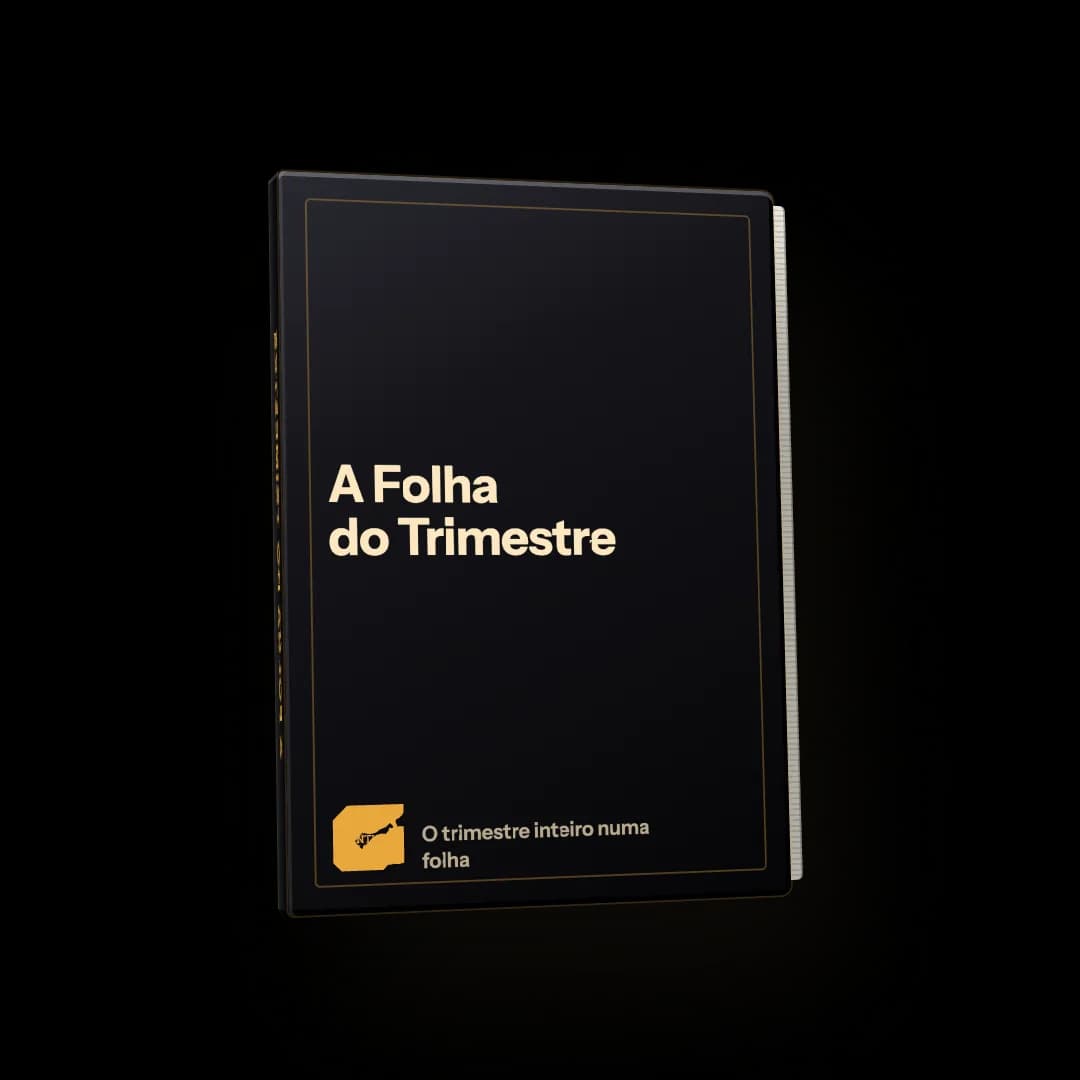 Caderno preto com acabamento dourado, de capa fechada